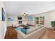 Modern living room with fireplace, comfortable seating, and a sliding glass door at 37 E 14Th Pl, Broomfield, CO 80020