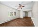 Sunlit living room with bay window and wood-look floors at 37 E 14Th Pl, Broomfield, CO 80020