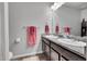 Bathroom with double vanity and granite countertops at 533 Pioneer Ct, Fort Lupton, CO 80621