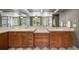 Luxurious bathroom with dual sinks, ample storage, and designer finishes at 722 Evening Star Dr, Castle Rock, CO 80108