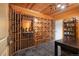 Spacious wine cellar with custom wood racks and a tiled floor at 722 Evening Star Dr, Castle Rock, CO 80108