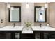 Elegant bathroom features a double vanity, decorative mirrors and pendant lighting at 6341 E Floyd Dr, Denver, CO 80222