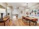 Stylish dining area featuring a chandelier, modern art, hardwood floors, and seating for six at 2059 S Columbine St, Denver, CO 80210