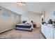 Spacious bedroom with vaulted ceilings, ample natural light, and neutral color palette at 14096 Roaring Fork Cir, Broomfield, CO 80023