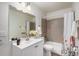 Bathroom with tiled shower-tub, sink vanity, and modern fixtures at 10150 E Virginia Ave # 7-304, Denver, CO 80247