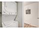 Laundry room featuring stacked washer and dryer at 10150 E Virginia Ave # 7-304, Denver, CO 80247