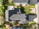 Aerial view of a single-Gathering home with a backyard patio, lush green lawn, and privacy fence at 11519 Wray Ct, Parker, CO 80134