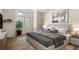 Inviting bedroom with ample natural light, stylish decor, and cozy furnishings for a relaxing retreat at 11519 Wray Ct, Parker, CO 80134