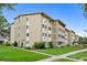 Multi-Gathering building with well manicured lawn and surrounding landscape at 9625 E Center Ave # 5C, Denver, CO 80247