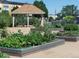 Community garden plots offer the chance to grow vegetables and flowers at 9625 E Center Ave # 5C, Denver, CO 80247