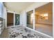 Enclosed sunroom with multiple sliding glass doors, providing great natural light at 9625 E Center Ave # 5C, Denver, CO 80247