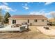 Backyard showcasing a deck, landscaping, and ample space, perfect for relaxation and outdoor enjoyment at 1133 Northridge Dr, Erie, CO 80516