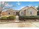 Attractive home with stone accents, manicured landscaping, and a walkway leading to the front entrance at 1133 Northridge Dr, Erie, CO 80516
