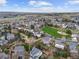 Wide aerial perspective of a neighborhood and community park at 20650 Parker Vista Cir, Parker, CO 80138
