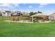 Outdoor playground with swings, slides, and climbing structures set amongst green lawns at 20650 Parker Vista Cir, Parker, CO 80138