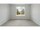 Bright bedroom with carpeted floors and large window at 4020 Upham St, Wheat Ridge, CO 80033