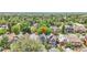 Aerial view of a charming neighborhood with tree-lined streets and well-maintained homes showcasing community charm at 444 S Pearl St, Denver, CO 80209