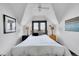 Inviting bedroom with white walls and ceiling, highlighting the unique architecture and cozy ambiance at 444 S Pearl St, Denver, CO 80209