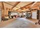 Spacious garage with ample storage, an overhead door, and a scooter at 444 S Pearl St, Denver, CO 80209