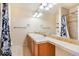 Double vanity bathroom with shower and tile flooring at 9965 E 143Rd Way, Brighton, CO 80602