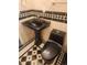 Elegant bathroom with black fixtures and tile flooring at 9965 E 143Rd Way, Brighton, CO 80602