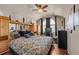 Spacious bedroom with built-in shelving and hardwood floors at 9965 E 143Rd Way, Brighton, CO 80602