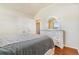 Bedroom with hardwood floors and dresser at 9965 E 143Rd Way, Brighton, CO 80602