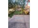 Landscaped front yard with sitting area and swing at 9965 E 143Rd Way, Brighton, CO 80602
