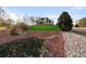 Landscaped front yard with rockery and manicured lawn at 9965 E 143Rd Way, Brighton, CO 80602