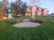 Landscaped front yard with circular patio at 9965 E 143Rd Way, Brighton, CO 80602