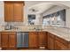 Spacious kitchen with ample cabinetry, granite countertops, and stainless steel appliances at 9965 E 143Rd Way, Brighton, CO 80602