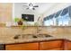 Kitchen with granite countertops, double sink and view to Gathering room at 9965 E 143Rd Way, Brighton, CO 80602