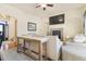 Living room with fireplace and built-in media console at 9965 E 143Rd Way, Brighton, CO 80602