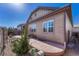 Cozy backyard featuring a stamped concrete patio and well-maintained landscaping at 12732 Fisher Dr, Englewood, CO 80112