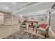 Spacious finished basement features neutral decor, a pool table, and comfortable seating for relaxation and entertainment at 12732 Fisher Dr, Englewood, CO 80112