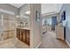 Contemporary bathroom with tiled shower, double vanity, and stylish decor at 12732 Fisher Dr, Englewood, CO 80112