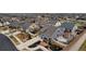 Neighborhood aerial view of home with landscaped yard, patio, and outdoor living spaces at 5519 Genoa St, Denver, CO 80249