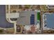 Aerial rooftop view of a home featuring solar panels, a gazebo, and a lush lawn at 5519 Genoa St, Denver, CO 80249