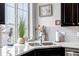 The natural light pouring through the windows makes this kitchen a pleasant place to work at 5519 Genoa St, Denver, CO 80249