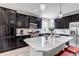 Well-equipped kitchen with granite counters and stainless steel appliances, great for Gathering and entertaining at 5519 Genoa St, Denver, CO 80249