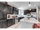Modern kitchen with sleek countertops and ample cabinet space, perfect for cooking and entertaining at 5519 Genoa St, Denver, CO 80249