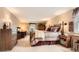 Spacious bedroom with a king-sized bed, desk, and ample closet space at 6432 E Jamison Cir, Centennial, CO 80112