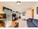 Spacious office featuring a couch and a large desk with office equipment on top at 6432 E Jamison Cir, Centennial, CO 80112
