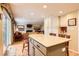Spacious kitchen flows into a living area, perfect for entertaining guests at 6432 E Jamison Cir, Centennial, CO 80112