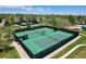 Aerial shot of well-maintained tennis courts offering recreational opportunities for residents at 6432 E Jamison S Cir, Centennial, CO 80112