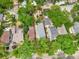 An aerial view of a suburban neighborhood with a boundary line highlighting the property's placement at 821 Collyer St, Longmont, CO 80501