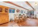 Cozy dining room with built-in cabinet and bench seating at 821 Collyer St, Longmont, CO 80501