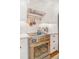 Gourmet kitchen with stainless steel appliances, white cabinets, brass accents, and designer finishes create a chef's dream at 821 Collyer St, Longmont, CO 80501