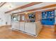 Cozy living room with brick fireplace and built-in shelving at 821 Collyer St, Longmont, CO 80501