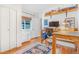 Home office with hardwood floors, natural light, and built-in shelving at 821 Collyer St, Longmont, CO 80501